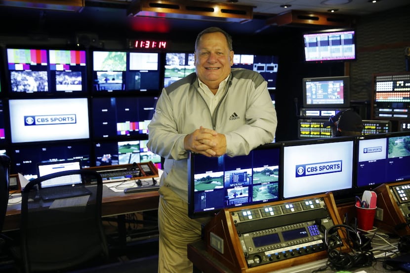 CBS producer Lance Barrow poses for a photo in the production truck during the Dean and...
