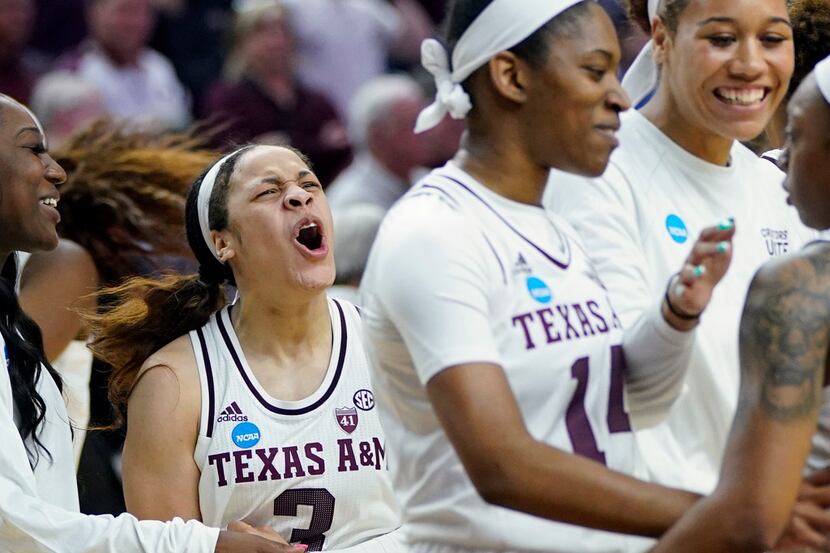 Texas A&M's Chennedy Carter (3) celebrates with teammates after a second round women's...