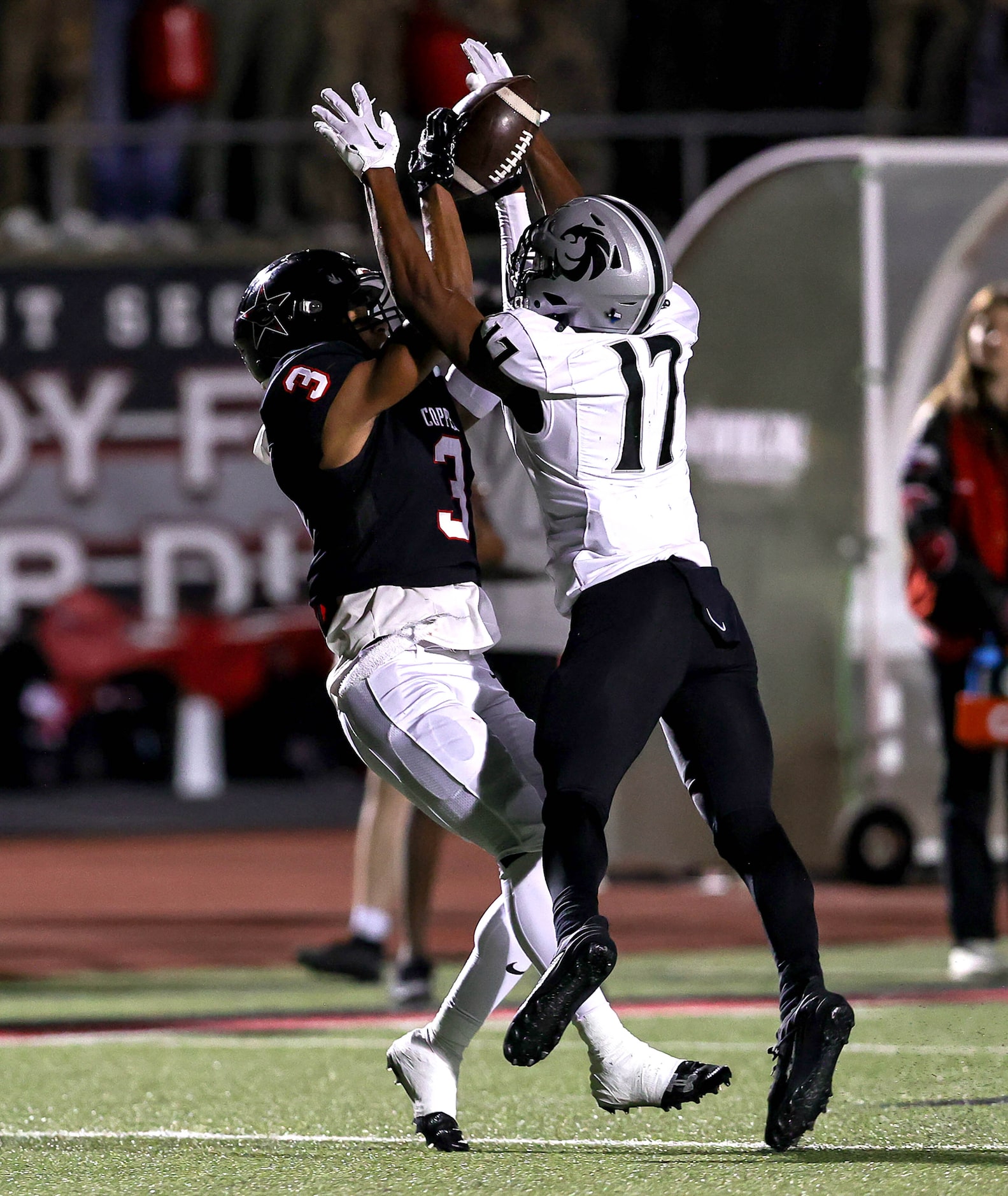 Denton Guyer defensive back DJ Reese (17) comes up with a interception against Coppell wide...