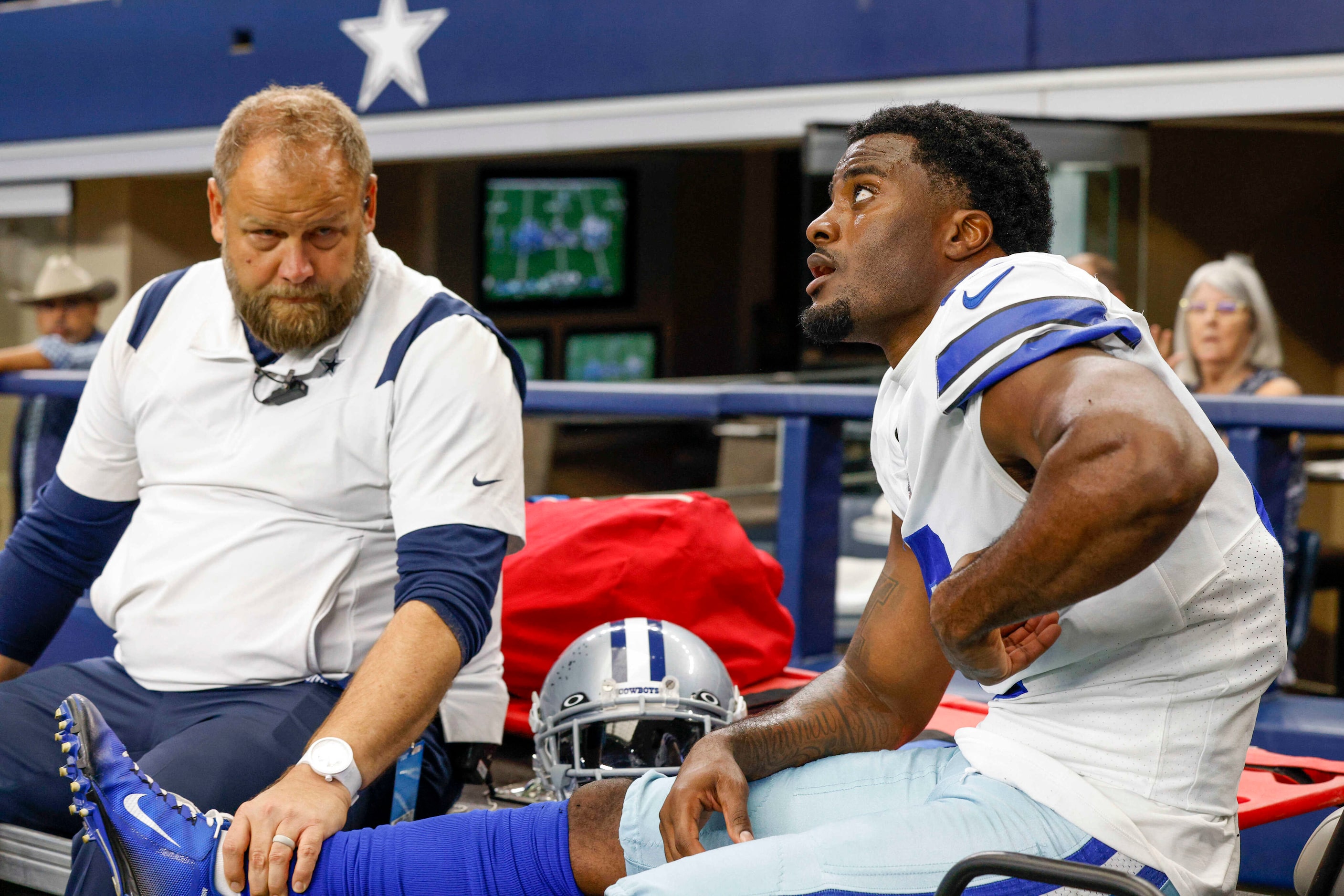 Dallas Cowboys cornerback Jourdan Lewis (2) is taken off the field on a cart after suffering...