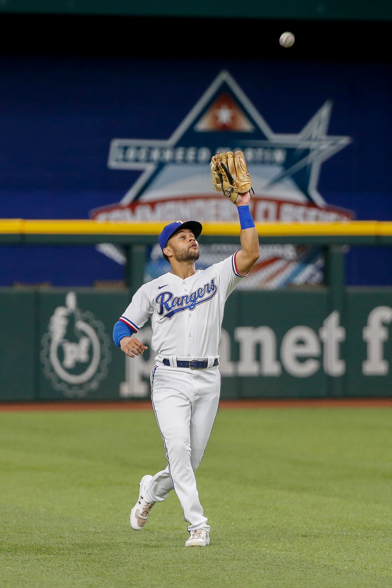 Texas Rangers left fielder Jason Martin (50) catches the ball off the bat of Seattle...