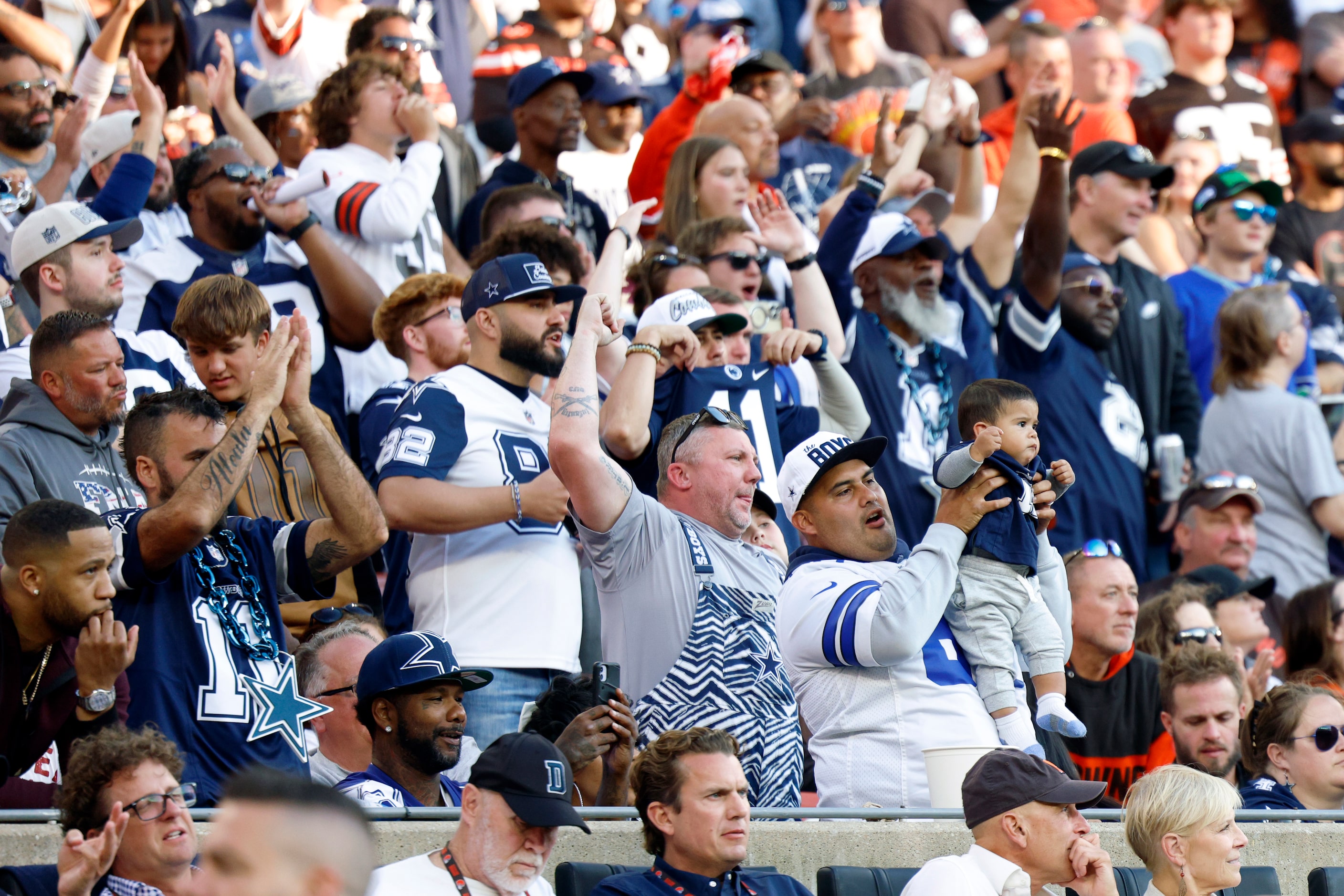 Dallas Cowboys fans cheer during the second half against the Cleveland Browns, Sunday, Sept....