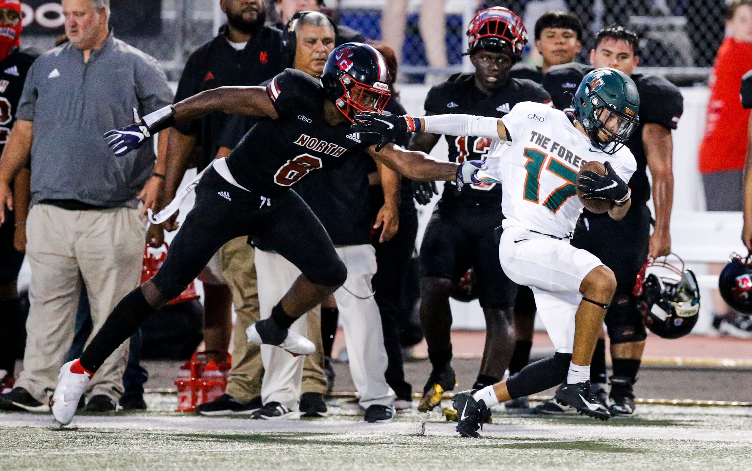 North Garland senior defensive back De’Aundre Johnson (8) forces Garland Naaman Forest...