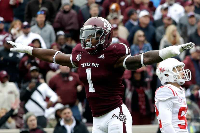 FILE - Texas A&M linebacker Buddy Johnson (1) celebrates after Mississippi kicker Luke...