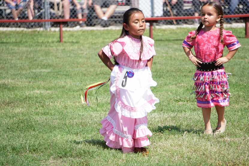 Ismarie Carillo and Elisabeth Walker dance during the 2018 Native American Pow Wow at...