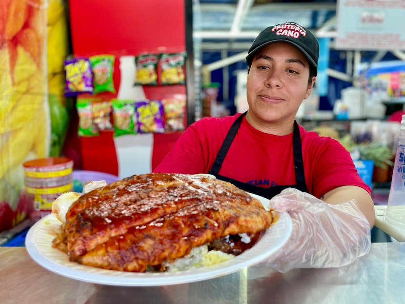 Brisa Monroy delivers a pambazo, a kind of torta filled with potatoes and chorizo bathed in...