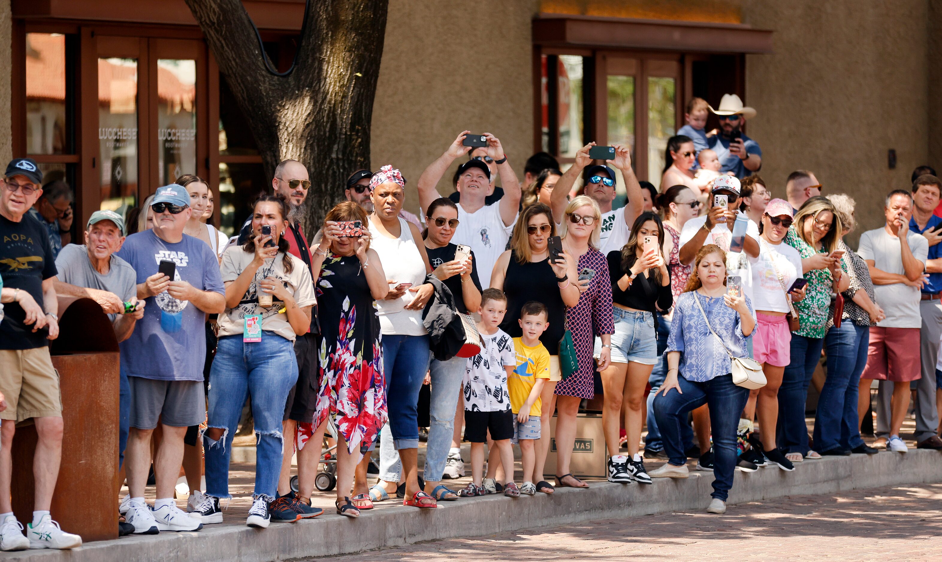 To the delight of tourists and visitors, drovers escorted the Fort Worth Herd down Exchange...