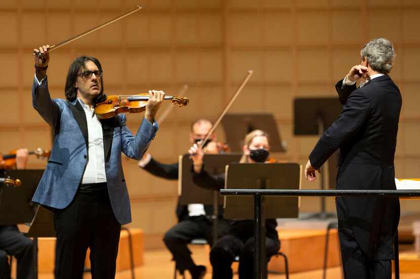 Violin soloist Leonidas Kavakos performs with music director Fabio Luisi and the Dallas...