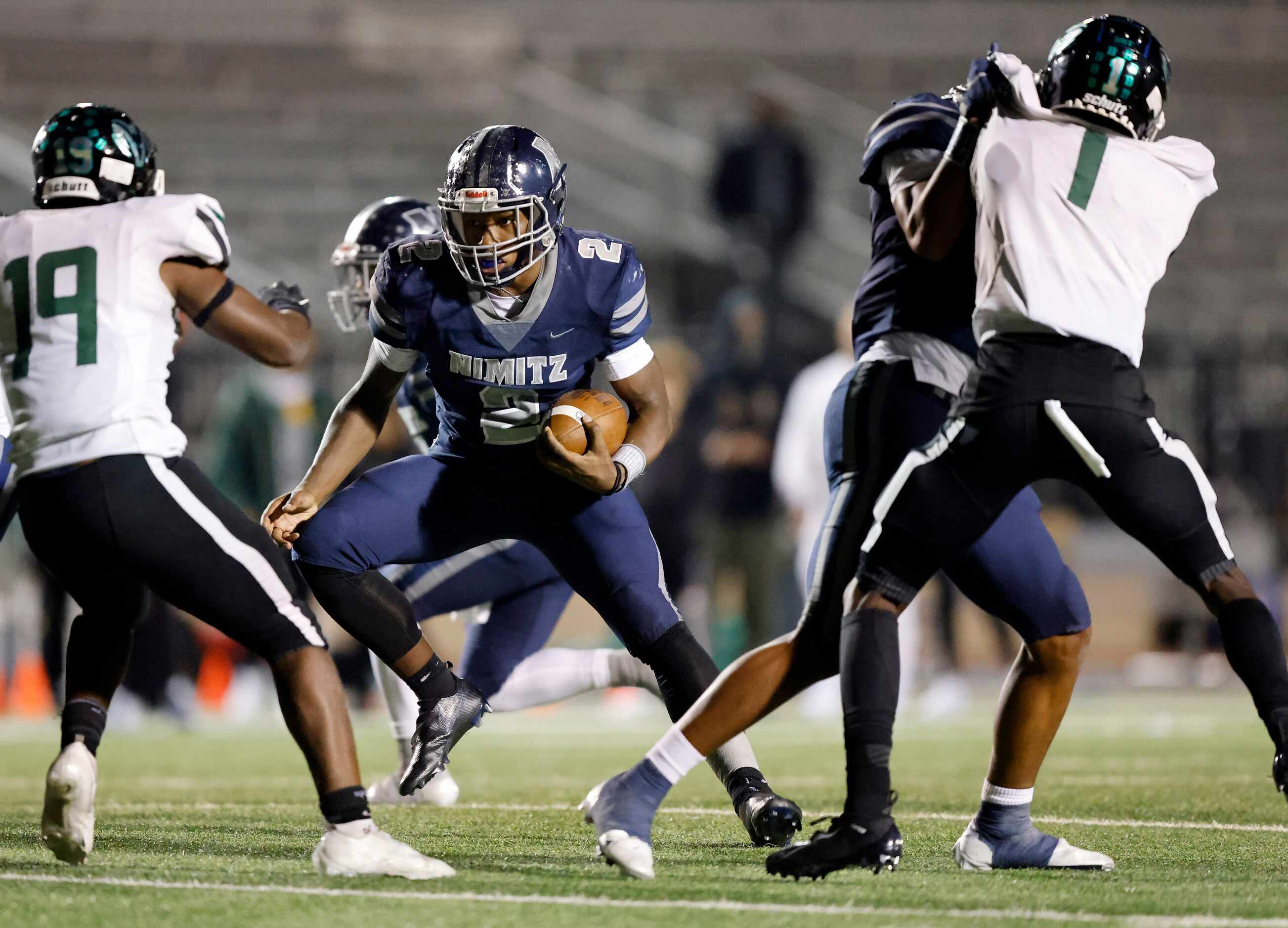 Irving Nimitz running back Eric Williams (2) carries the ball against Richardson Berkner...