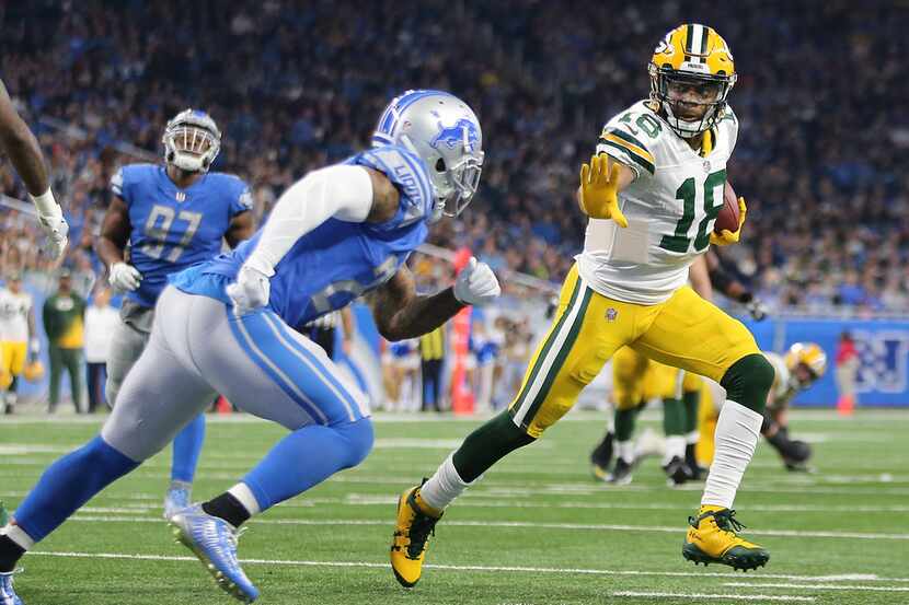 DETROIT, MI - DECEMBER 31: Randall Cobb #18 of the Green Bay Packers runs for a touchdown...