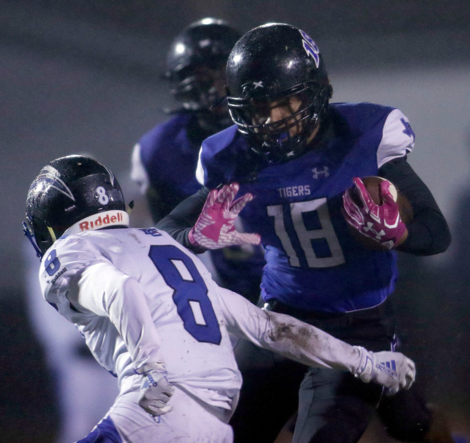 Trinity Christian-cedar Hill running back Emari Matthews (18) rambles into the Chargers...