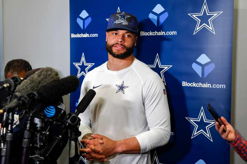 Dallas Cowboys quarterback Dak Prescott (4) speaks with reporters after practice at The Star...