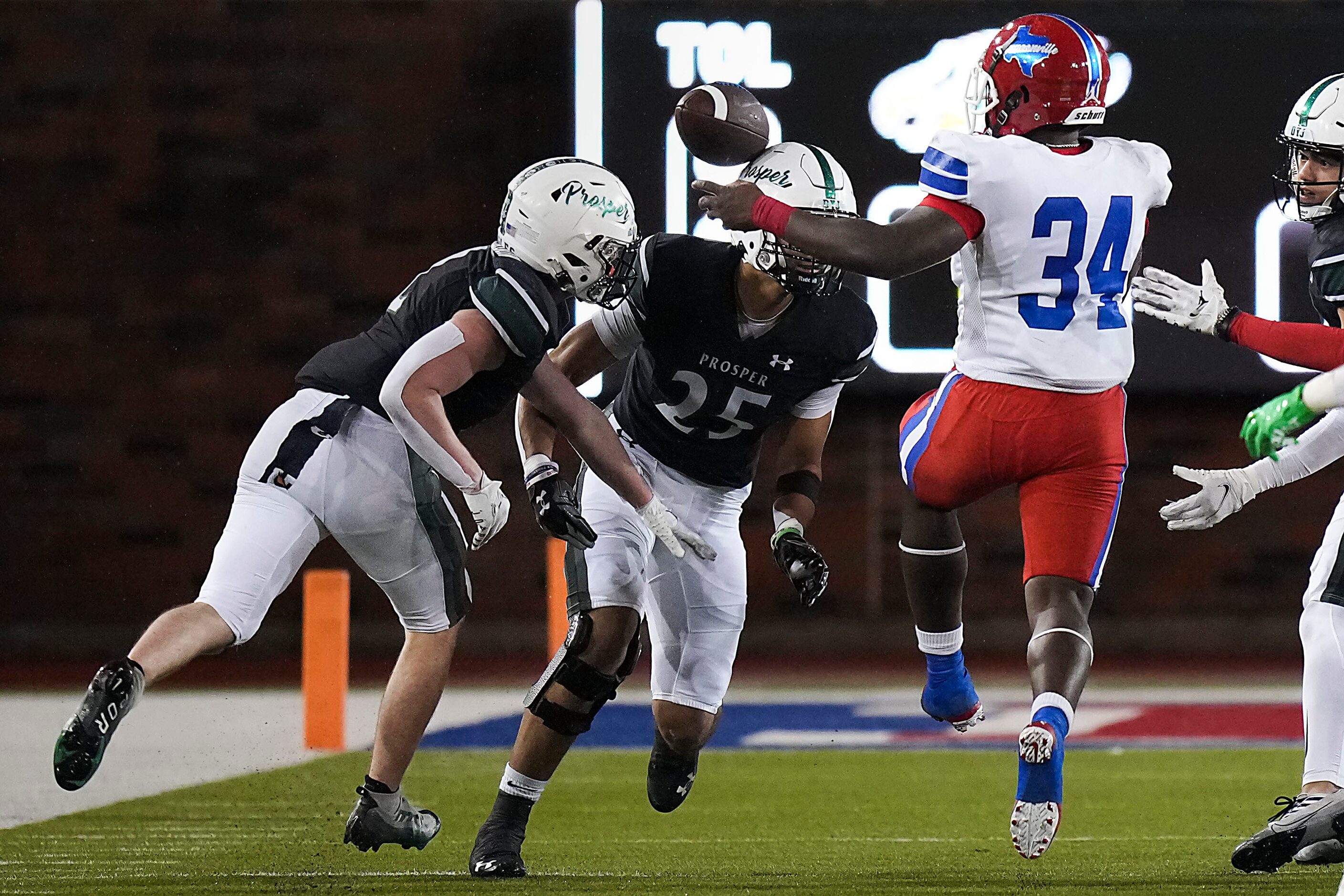 Duncanville running back Jaqualon Armstrong (34) fumbles the ball out of bounds as it...