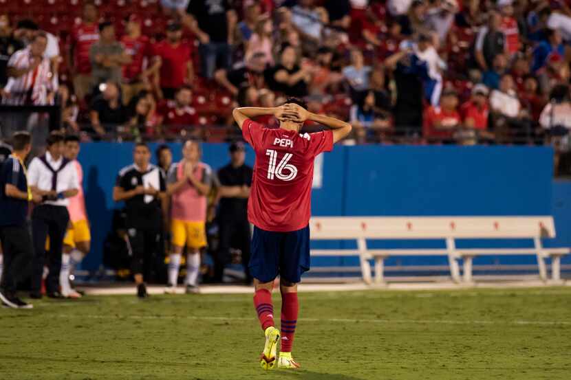 FC Dallas forward Ricardo Pepi (16) puts his hands on his head as the officials end the game...