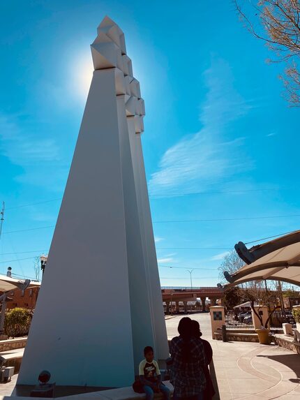 Binational families gather at the monument known as the Aguacero (Downpour) in El Paso to...