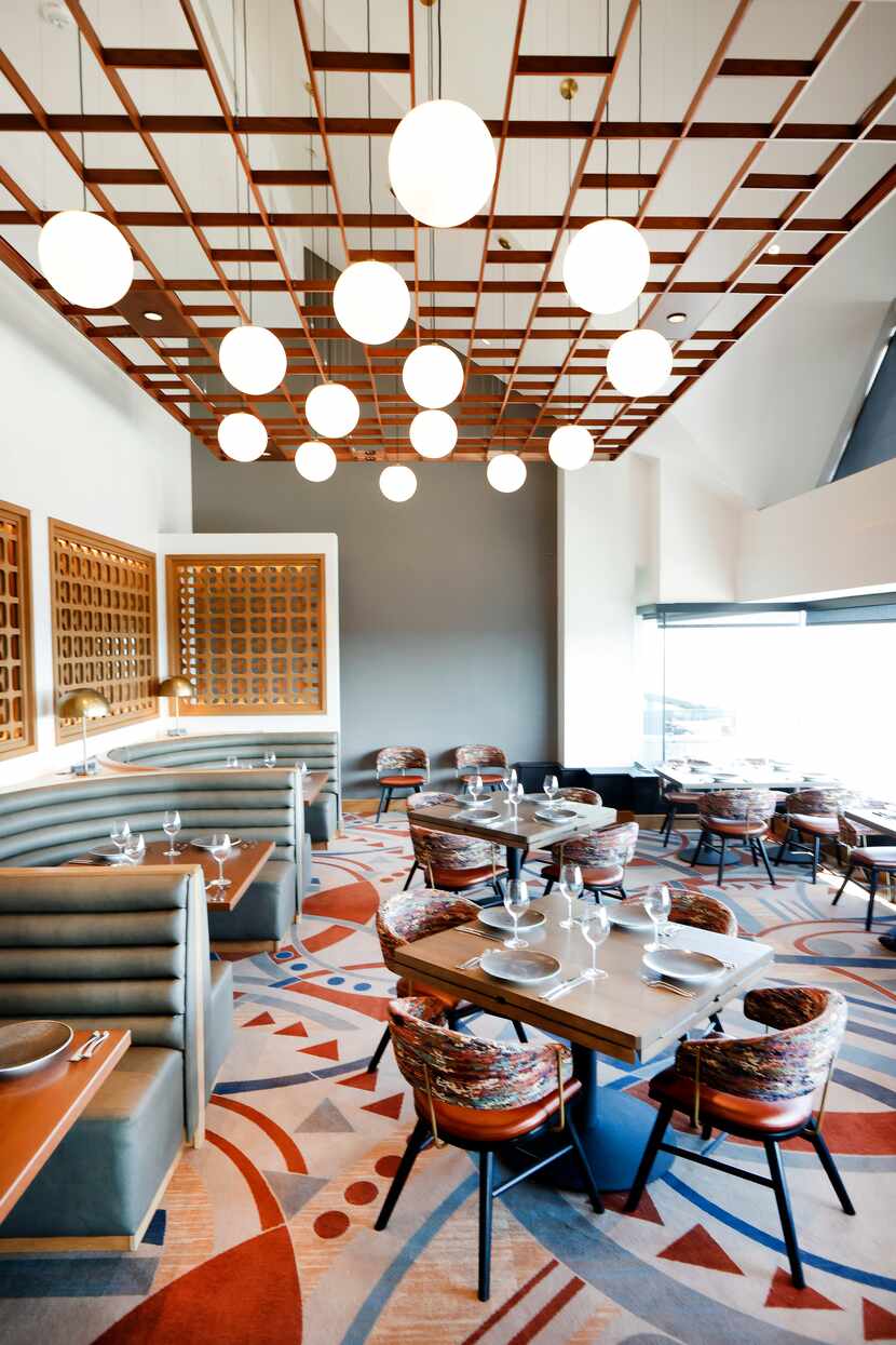 An interior view of the restyled mid-century modern Constellation Club dining area atop The...