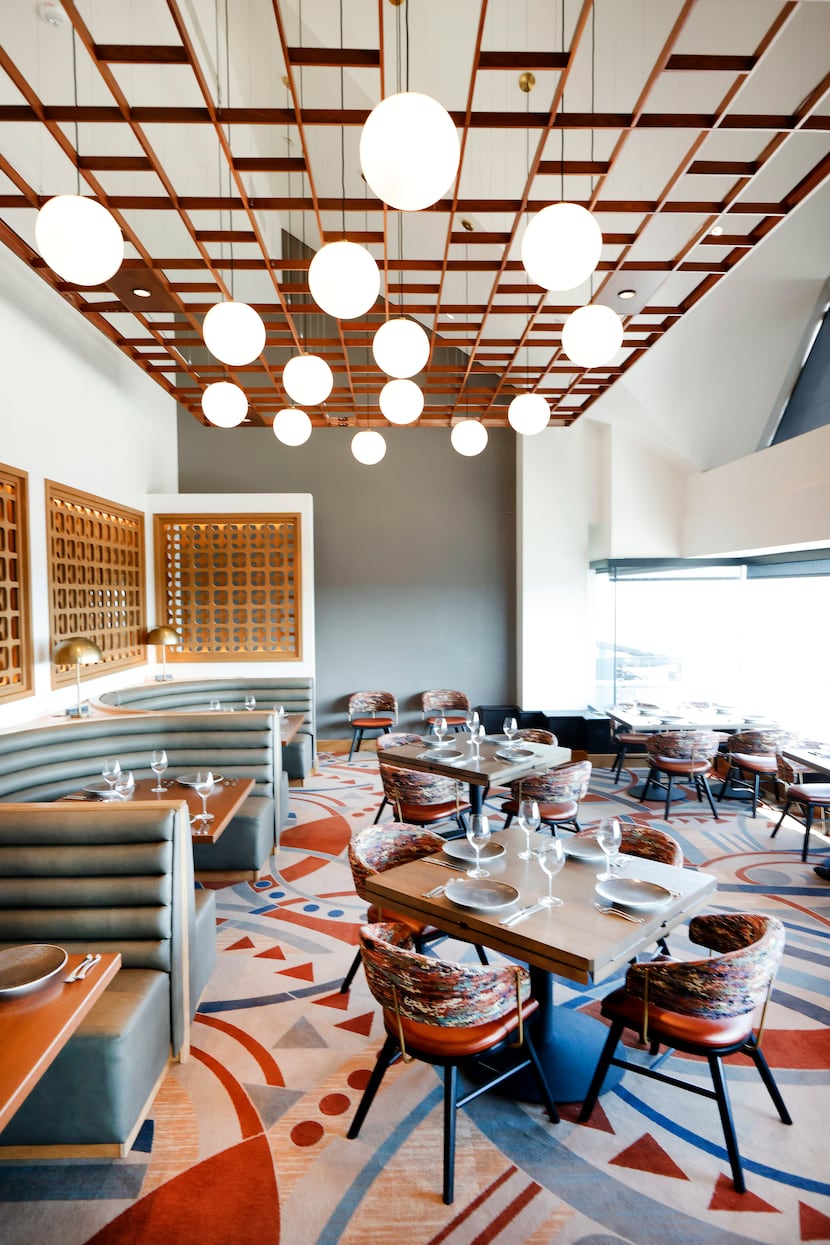 An interior view of the restyled mid-century modern Constellation Club dining area atop The...