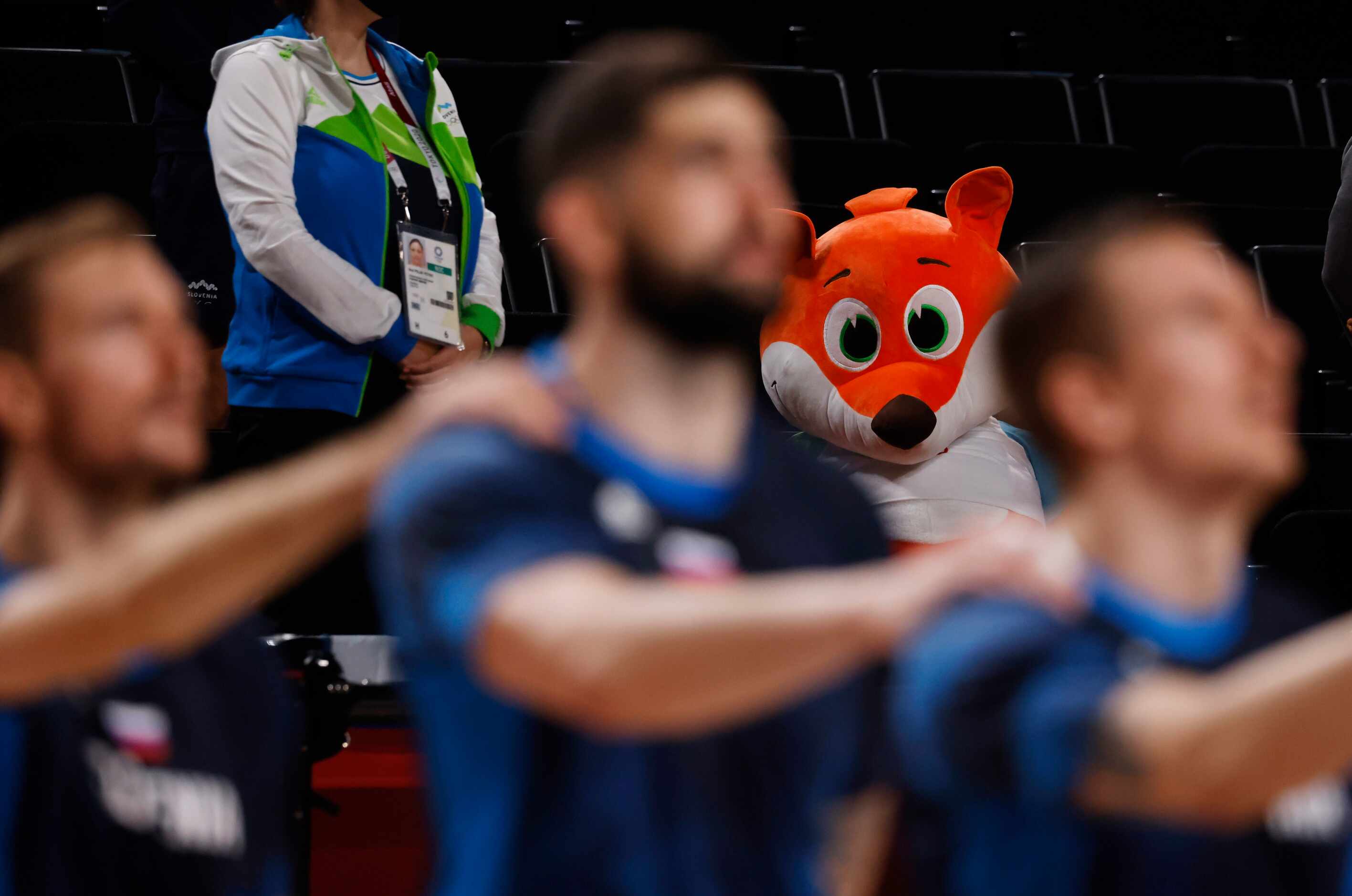 A stuffed animal sits at watch as the national anthem for Slovenia plays before a game...