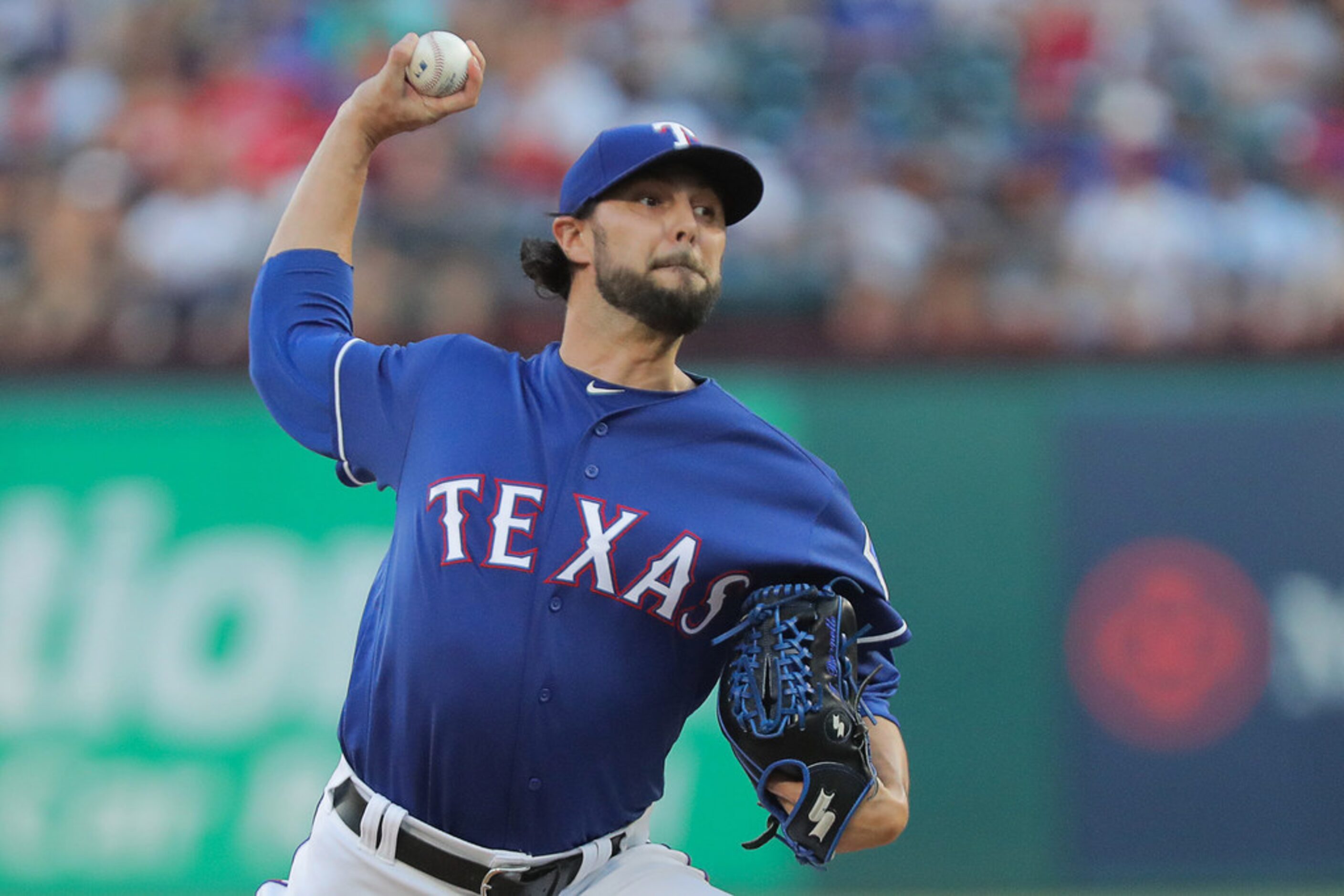 Texas Rangers relief pitcher Tony Barnette (43) pitches in the fifth inning as the New York...