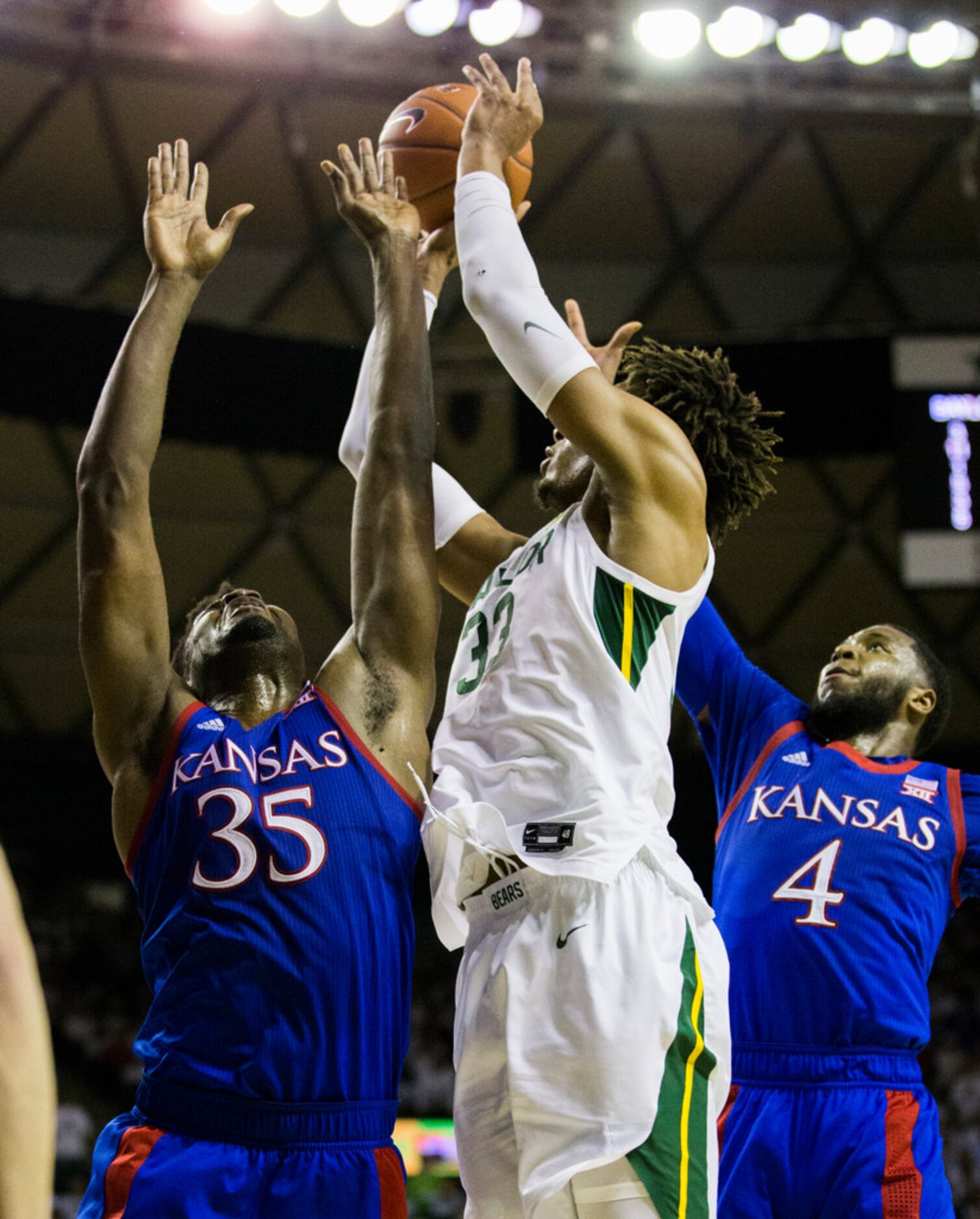 Baylor Bears forward Freddie Gillespie (33) takes a shot over Kansas Jayhawks center Udoka...