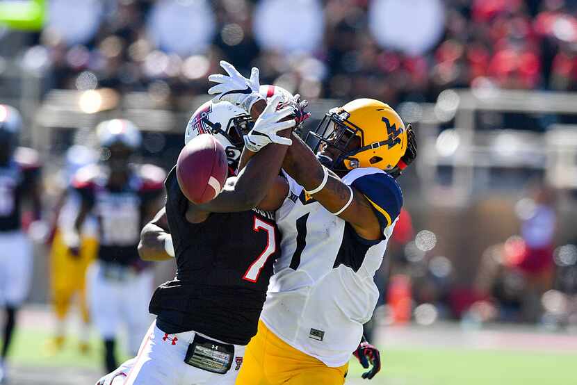 LUBBOCK, TX - OCTOBER 15: Jah'Shawn Johnson #7 of the Texas Tech Red Raiders breaks up a...