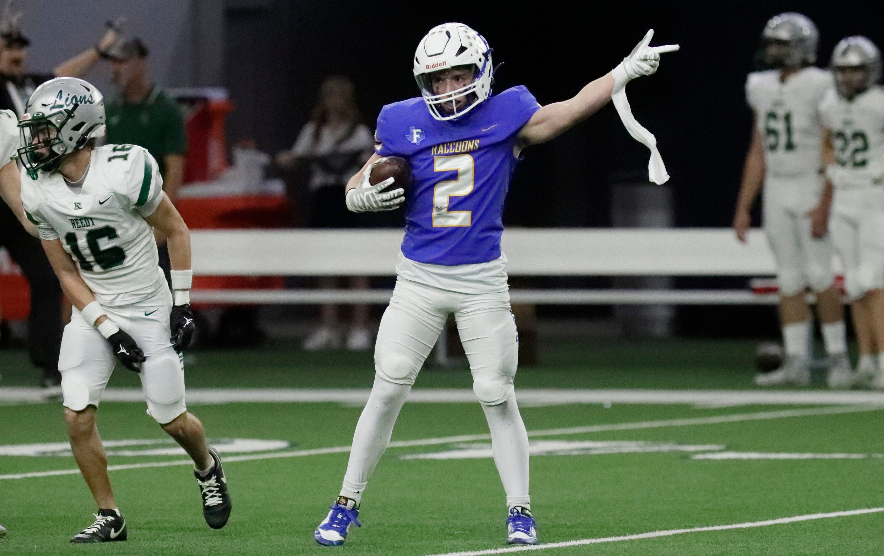 Frisco High School wide receiver Jackson Voris (2) signals first down after a catch during...