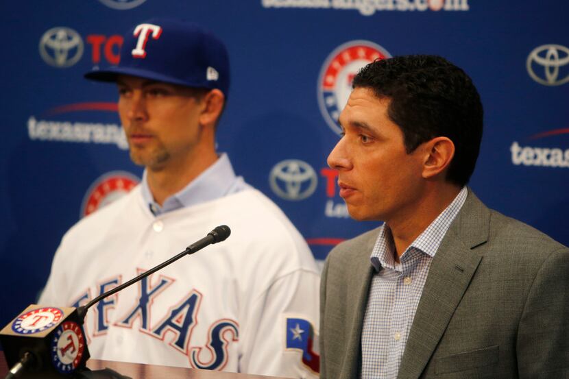 Texas Rangers General Manager Jon Daniels speaks to the press after signing pitcher Mike...