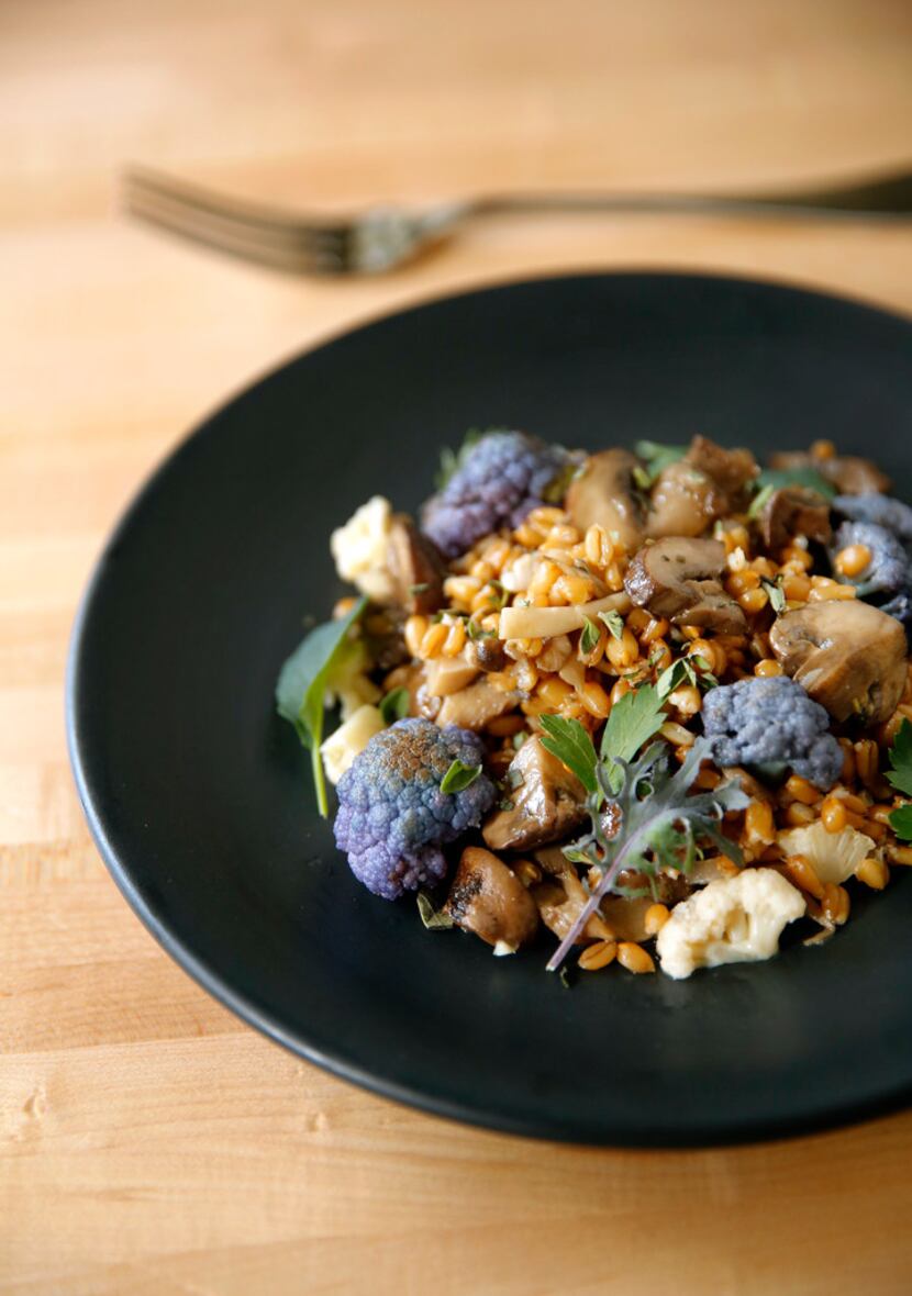 Sachet co-owner and chef Stephen Rogers prepared a Farro Salad with Mushrooms at his Oak...