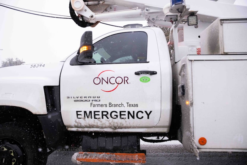 An Oncor emergency truck pulls into the Oncor Electric Delivery center in Dallas on...