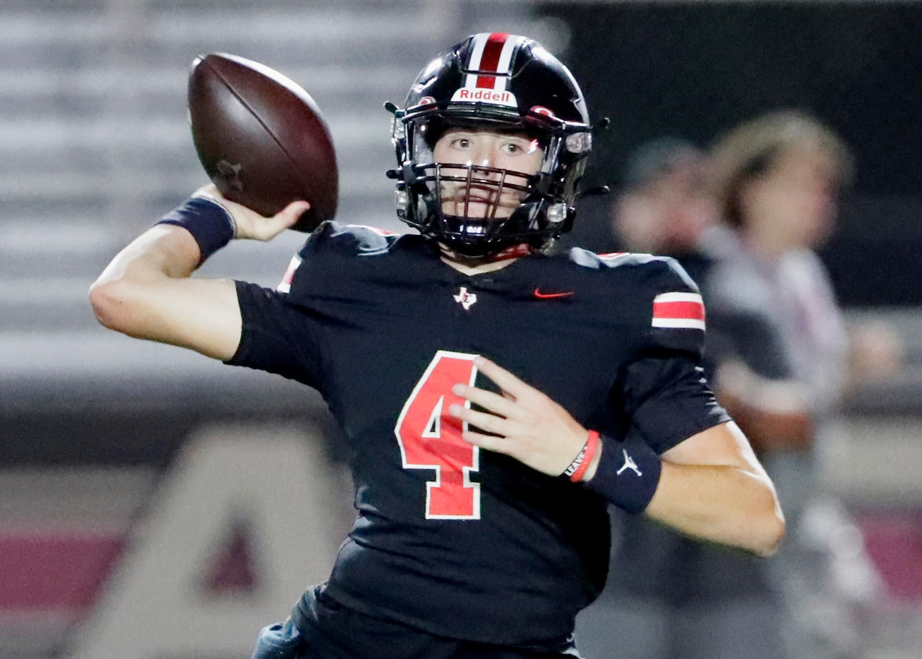 Lovejoy High School quarterback Jacob Janecek (4) throws a pass during the first half as...