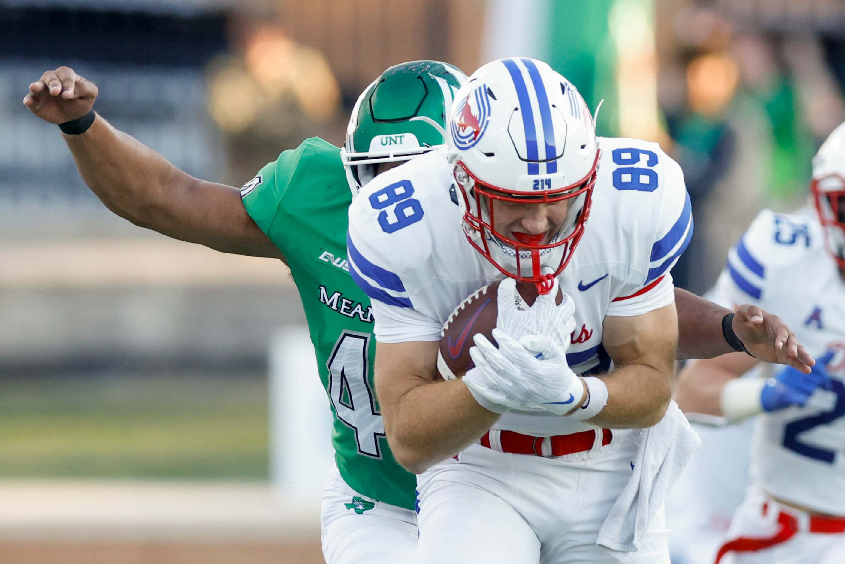 UNT linebacker Mazin Richards (44) tackles SMU tight end Gage Haskin (89) during the first...