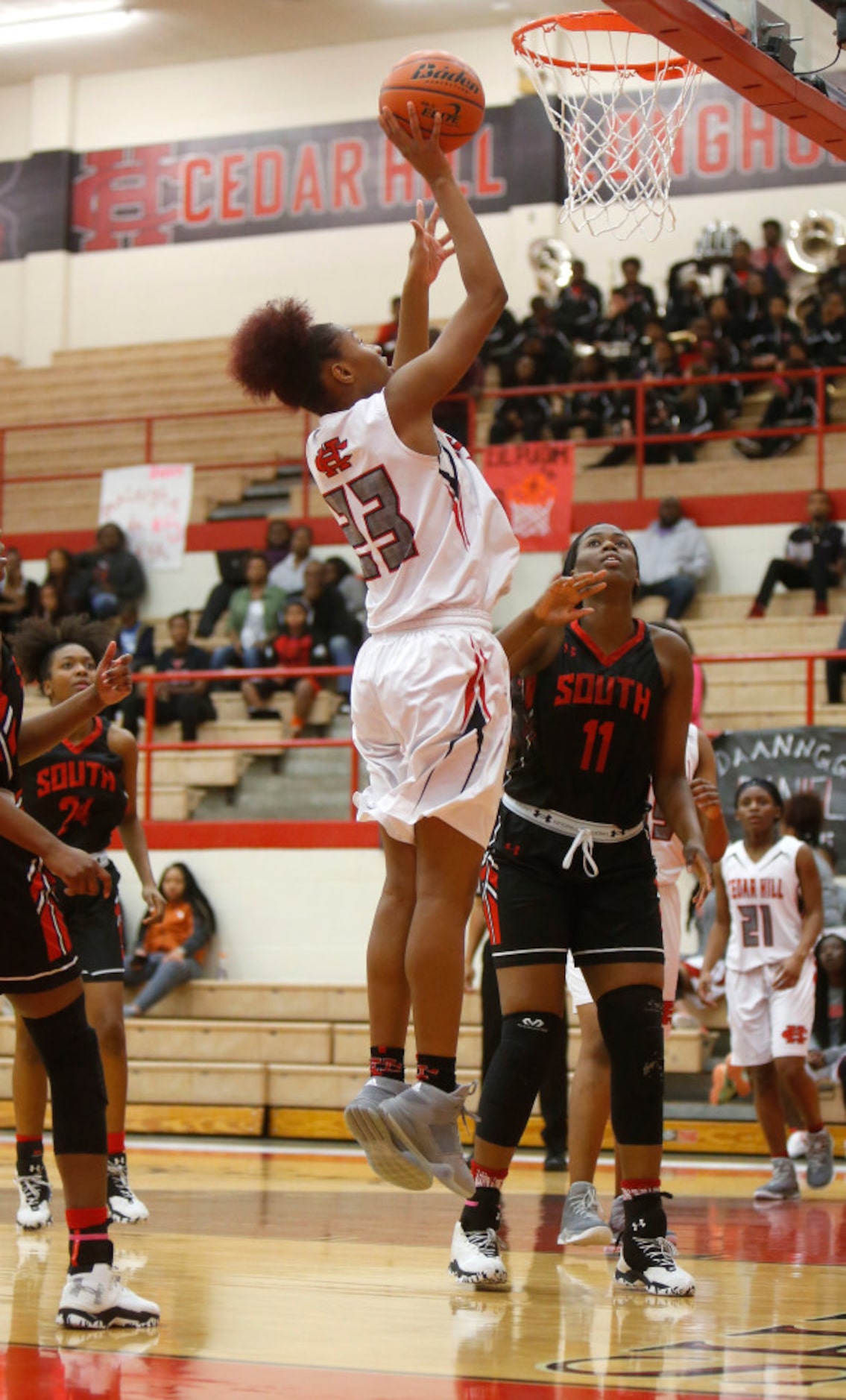 Cedar Hill forward Anzhane Hutton (23) lays up a shot against South Grand Prairie during the...