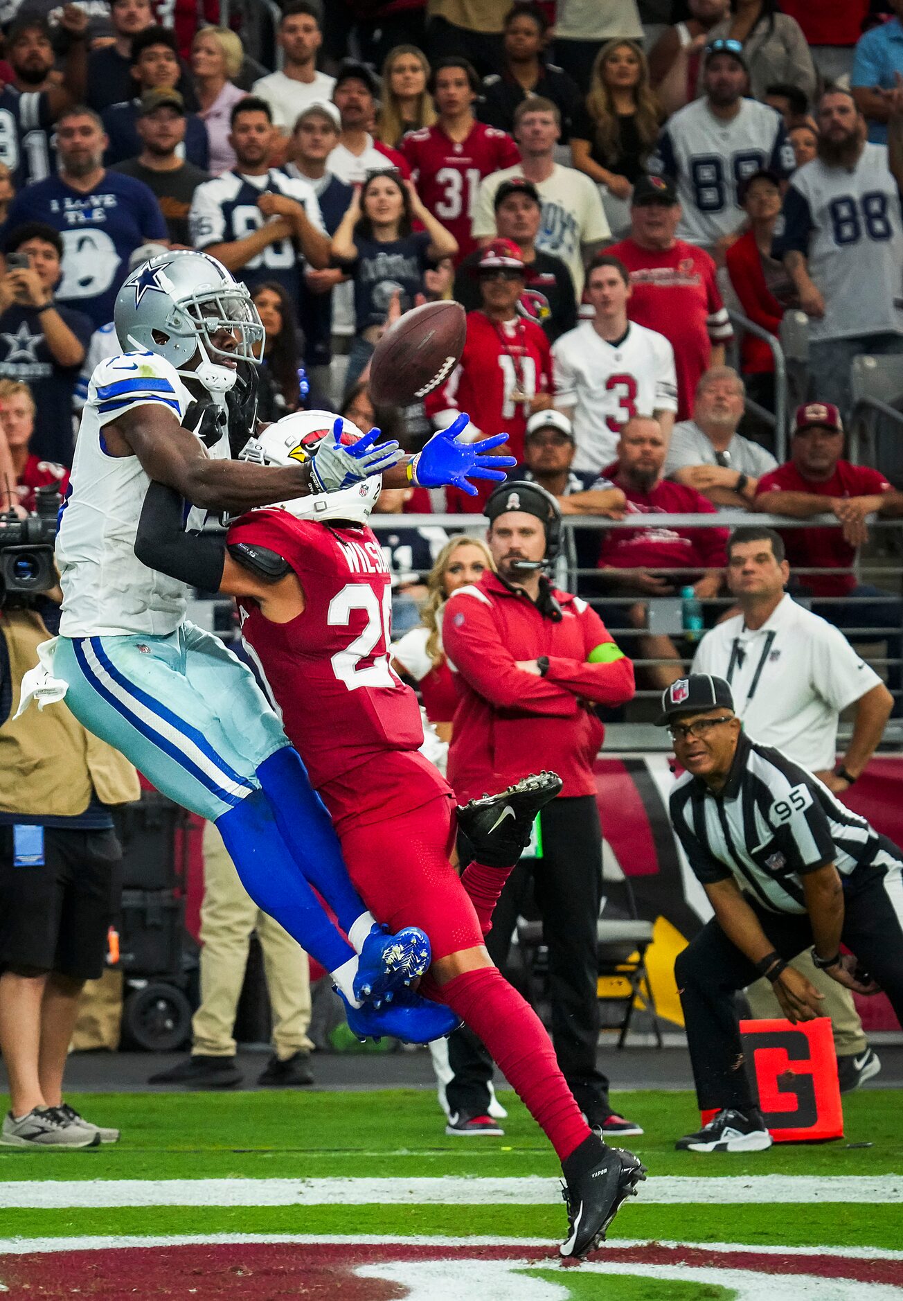 Arizona Cardinals cornerback Marco Wilson (20) breaks up a pass in the end zone intended for...