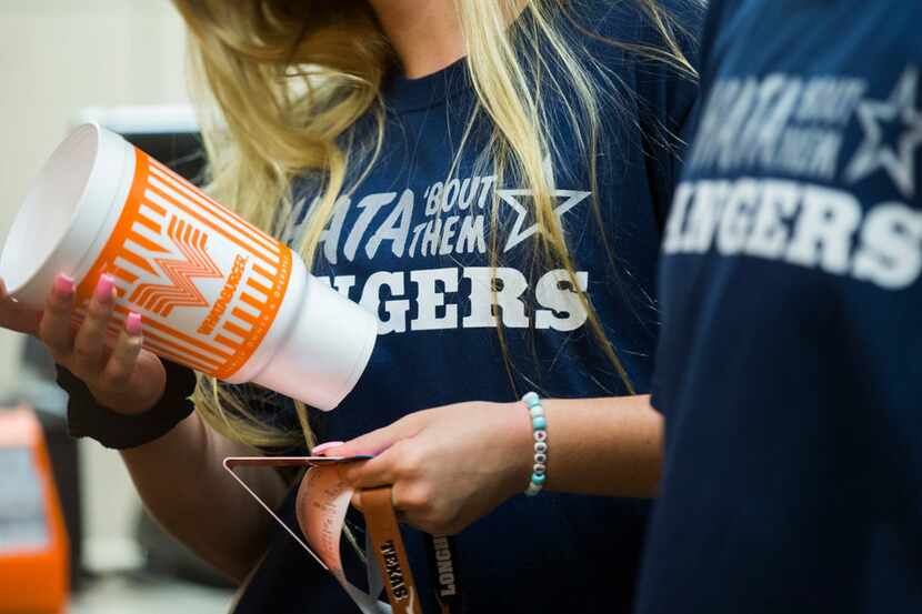 A Houston reporter posted a weather hack on TikTok that showed a Whataburger cup serving as...