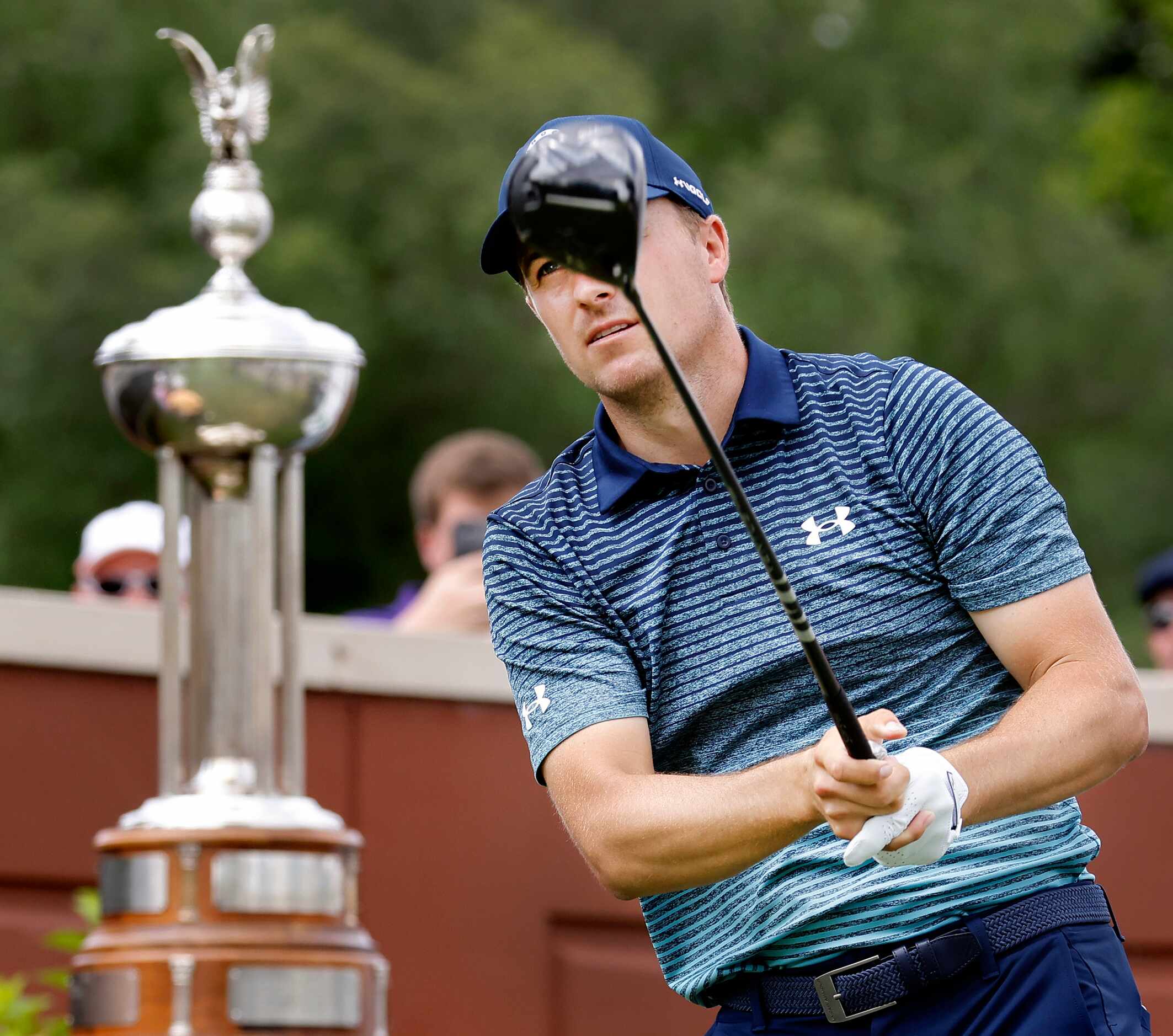 Professional golfer Jordan Spieth watches his drive on No. 1 during round one of the Charles...