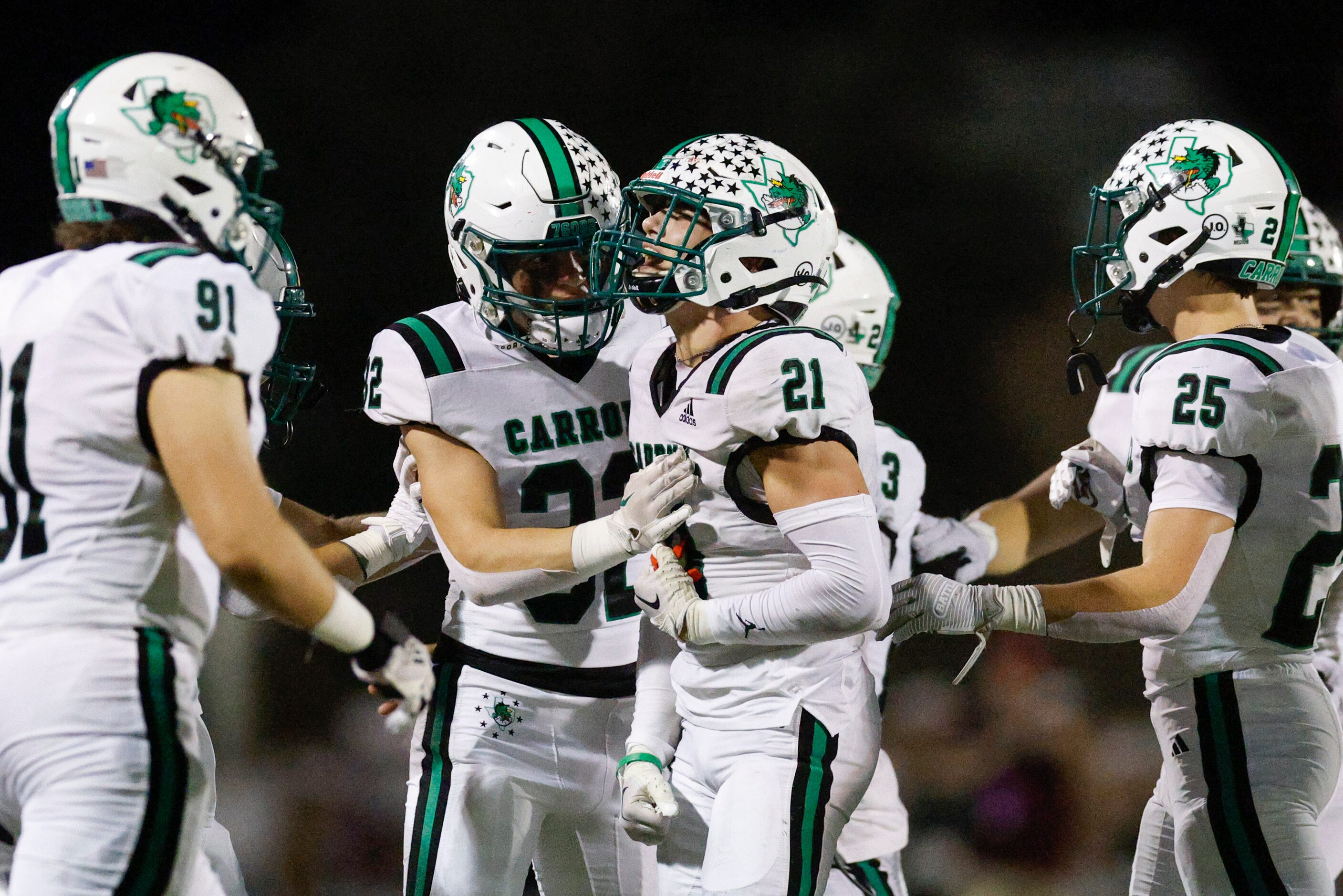 Southlake Carroll defensive back Zack Engelhardt (21) celebrates his interception with...