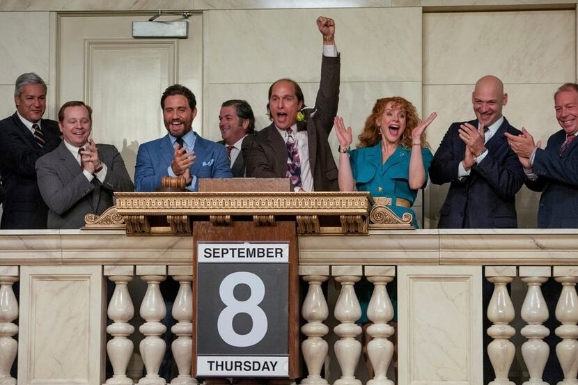 Kenny Wells (Matthew McConaughey, center) hits the ending bell after his company lists on...