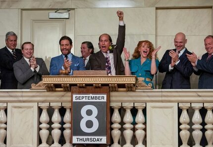 Kenny Wells (Matthew McConaughey, center) hits the ending bell after his company lists on...