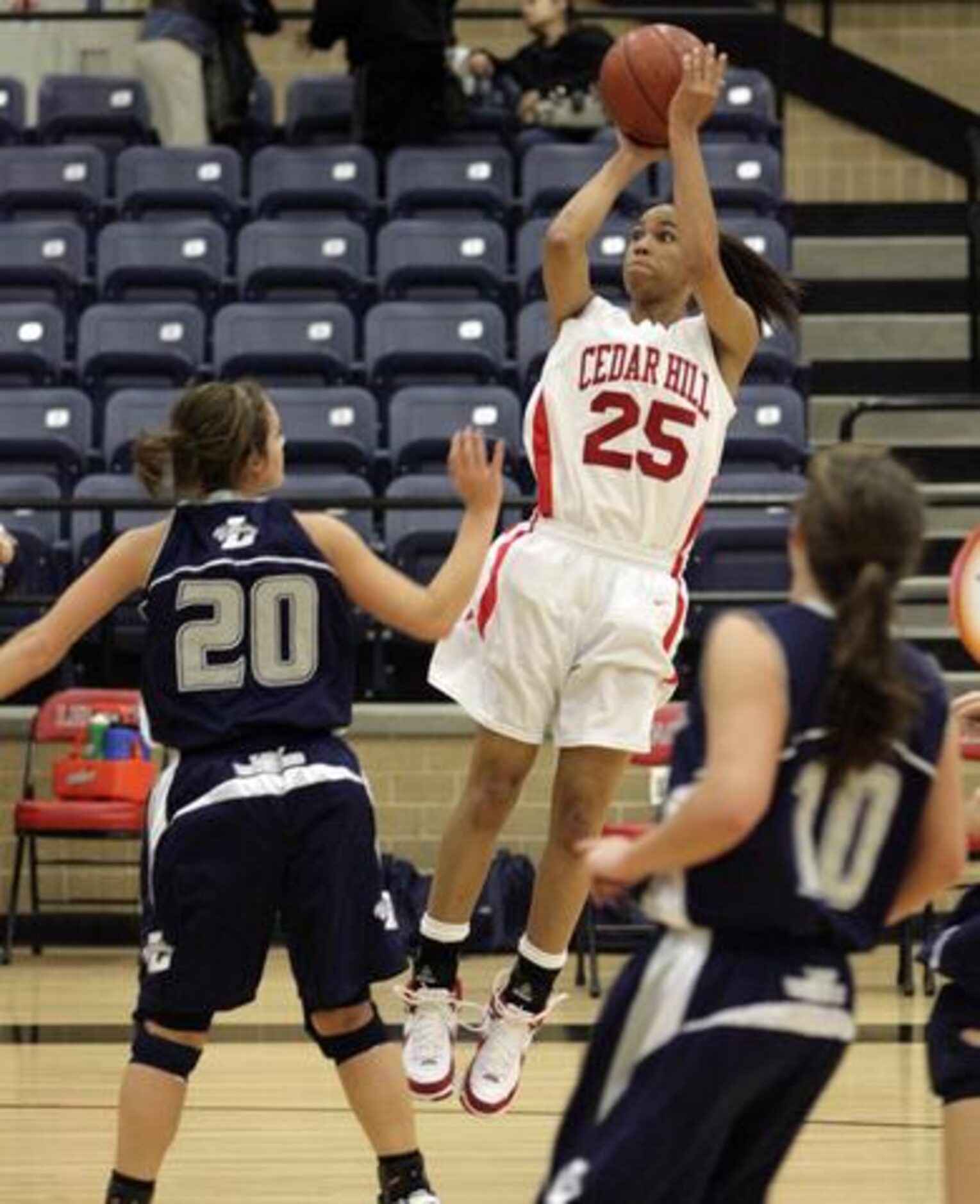 Cedar Hill senior forward Skylar Collins shoots over Argyle Liberty Christian's Madison...