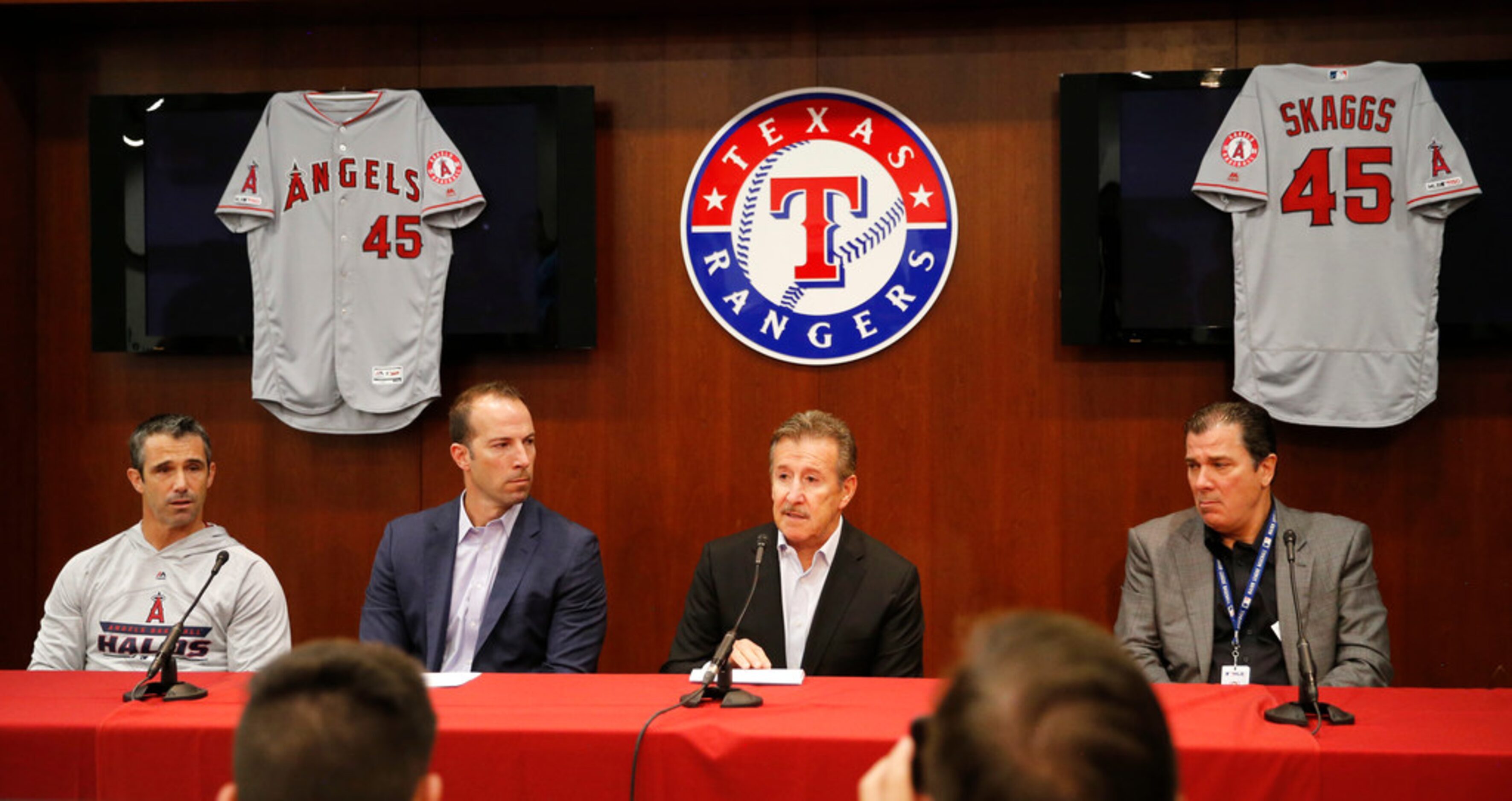 Los Angeles Angels manager Brad Ausmus, general manager Billy Eppler, owner Arte Moreno and...