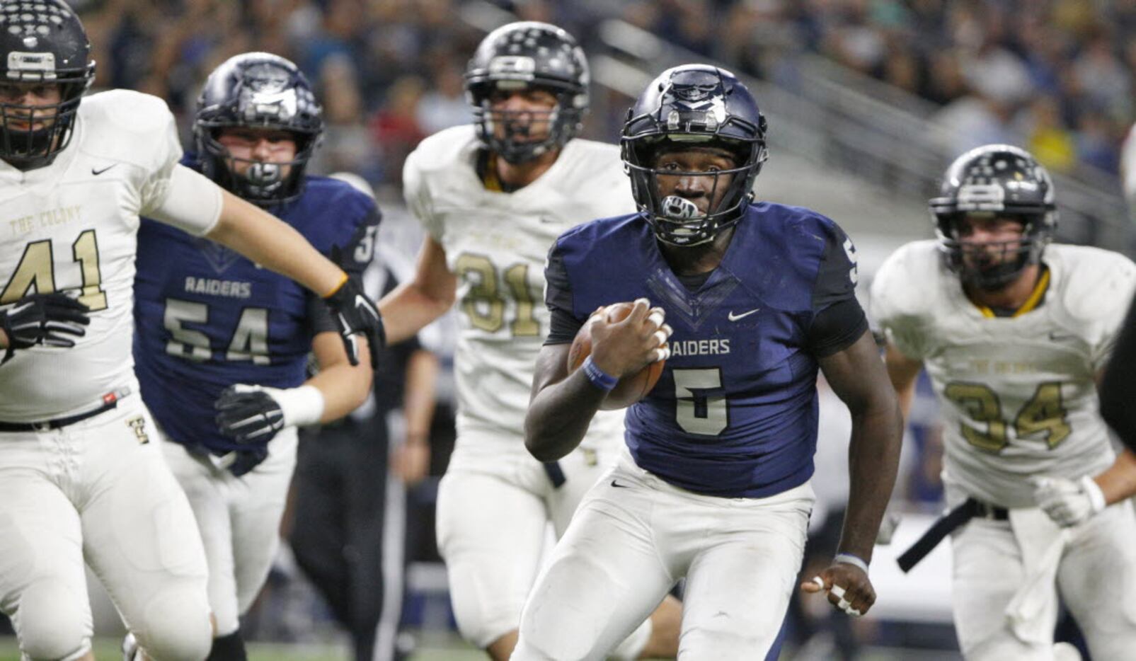 Wylie East's Eno Benjamin (5) runs the ball in for a touchdown  against The Colony in the...