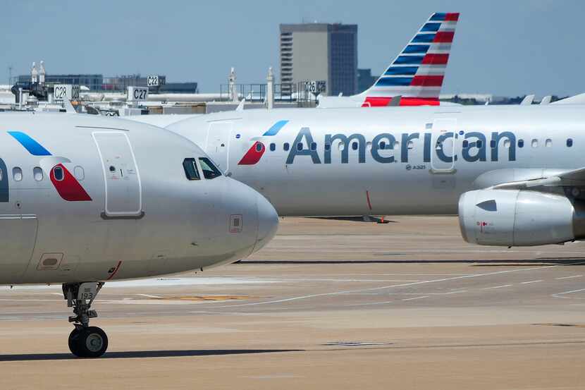 American Airlines at the gates of Terminal C at DFW International Airport.