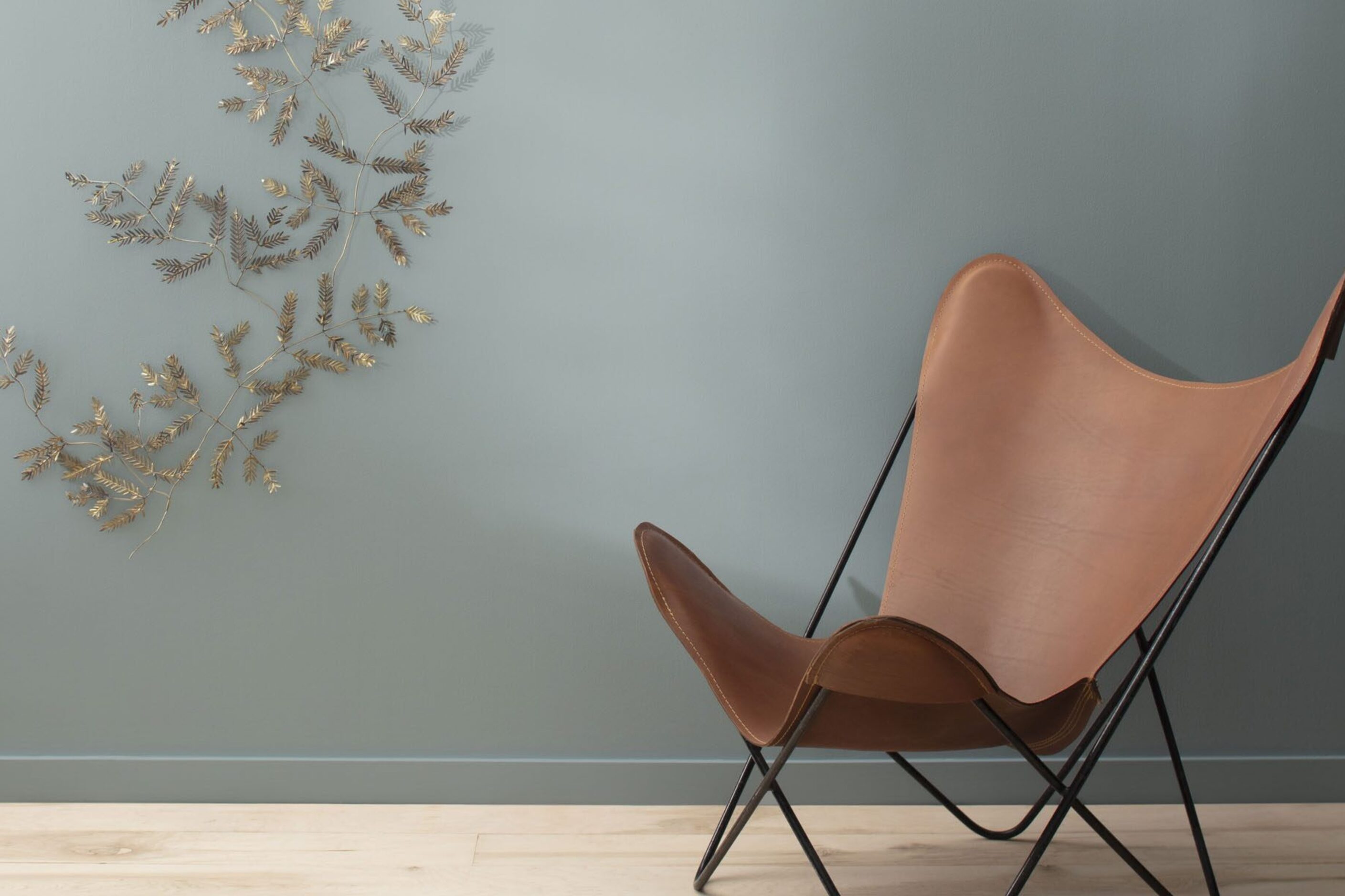 Chair by blue wall