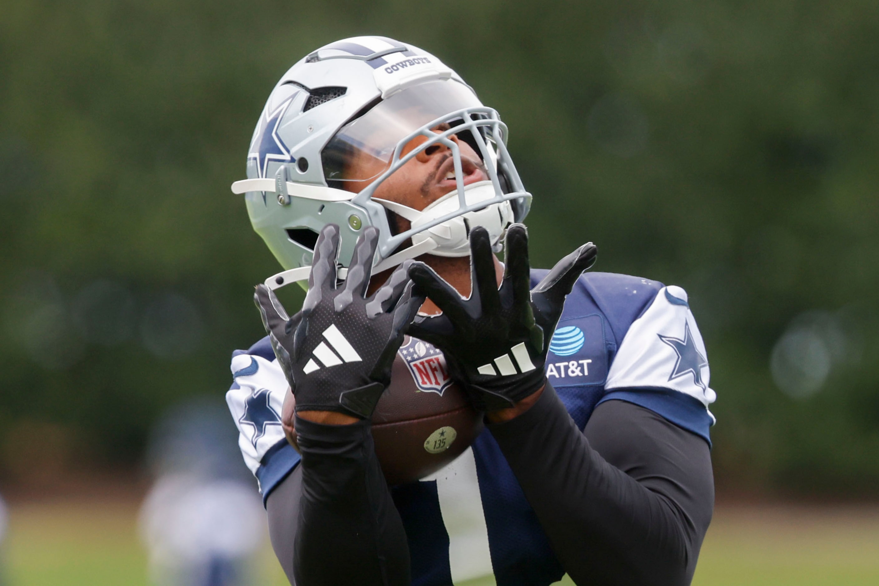 Dallas Cowboys linebacker Micah Parsons (11) receives a pass during a team practice, on...