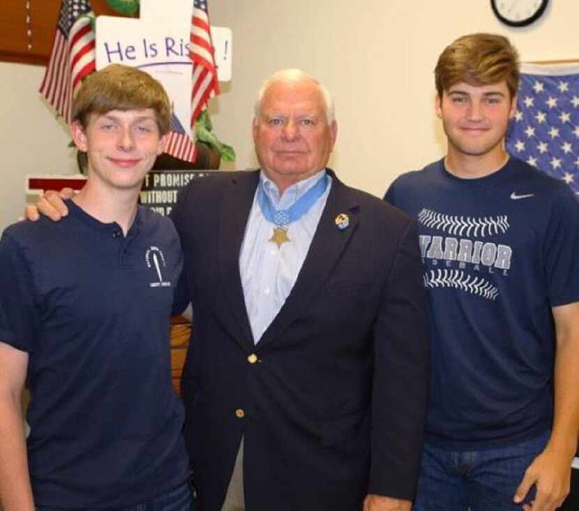 Medal of Honor recipient Lt. Michael E. Thornton, with Liberty Christian  students Henry...