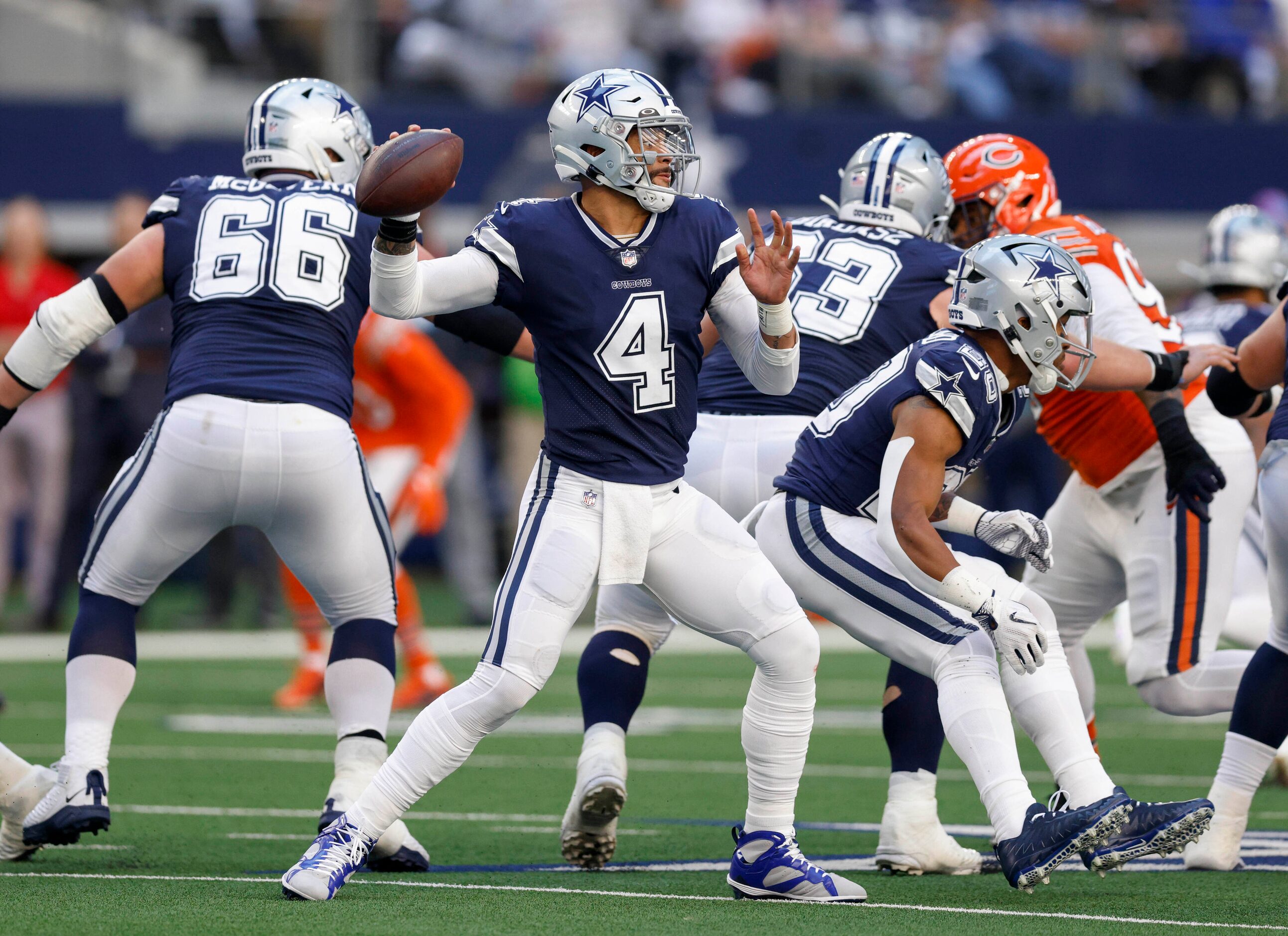 Dallas Cowboys quarterback Dak Prescott (4) throws a pass during the first half of an NFL...