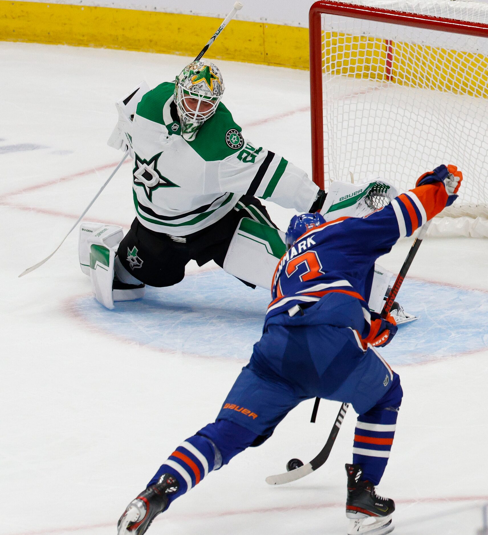 Edmonton Oilers center Mattias Janmark (13) scores a goal against Dallas Stars goaltender...