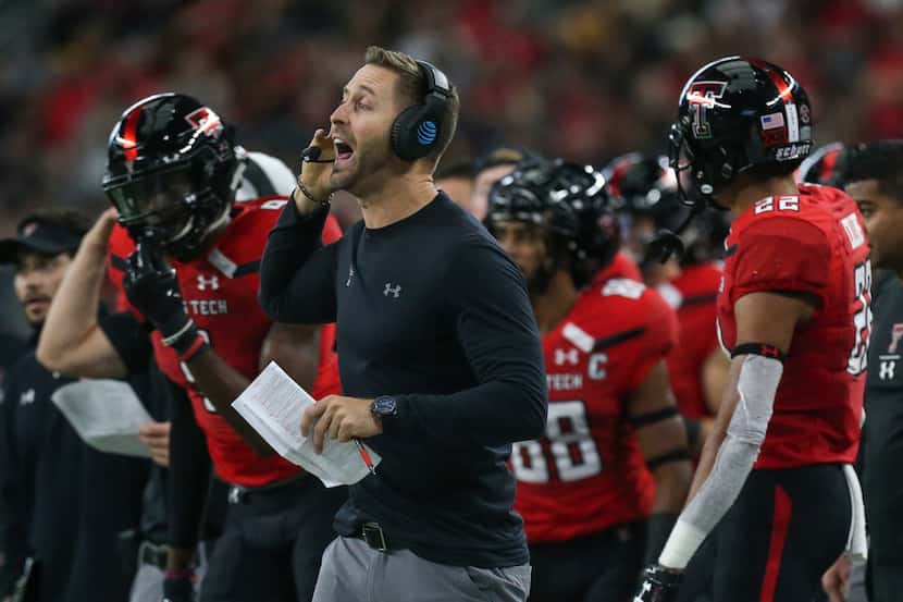 Texas Tech Red Raiders head coach Kliff Kingsbury calls out a play during a matchup between...