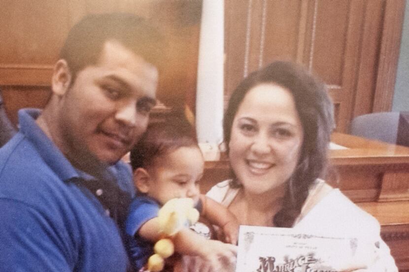 Erick Muñoz, shown holding the couple’s son, Mateo, has been asking for his wife, Marlise...