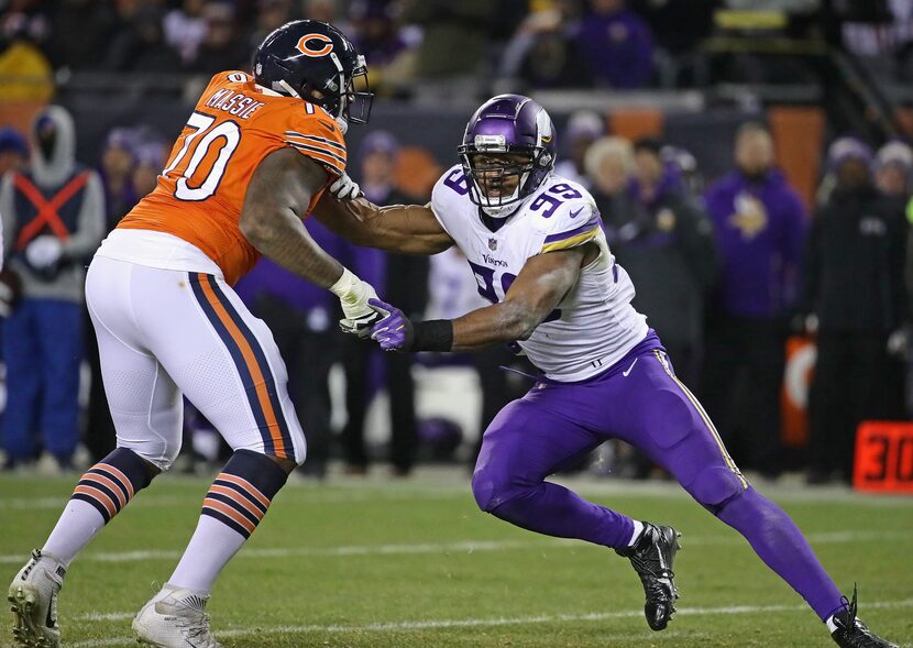 CHICAGO, IL - NOVEMBER 18:  Danielle Hunter #99 of the Minnesota Vikings rushes against...